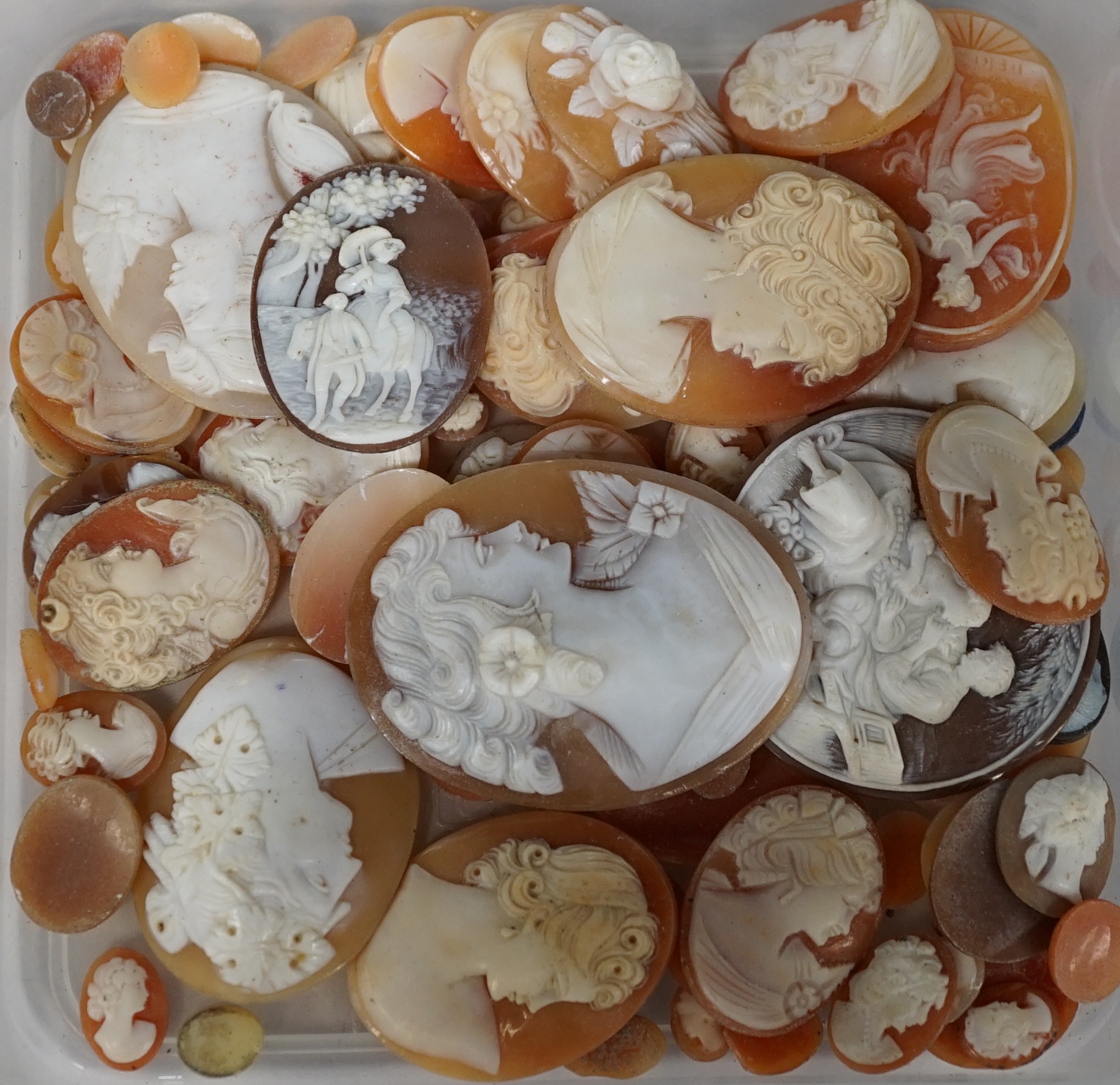 A quantity of assorted unmounted mainly cameo shells, largest 53mm. Condition - poor to fair to good